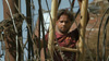 Loha attaching a katiya to a high-tension line