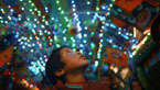 Electricity finally arrives in a remote Bhutan village and a boy monk treks to city to acquire a TV.