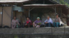 Old ladies wait for Uncle Joe's truck.