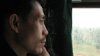 The father ponders on his journey back home when the train gets near his village.