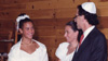 Lacey and her parents dressed up at the podium at her Bat Mitzvah