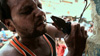 Loha Singh ripping open a live wire with his teeth